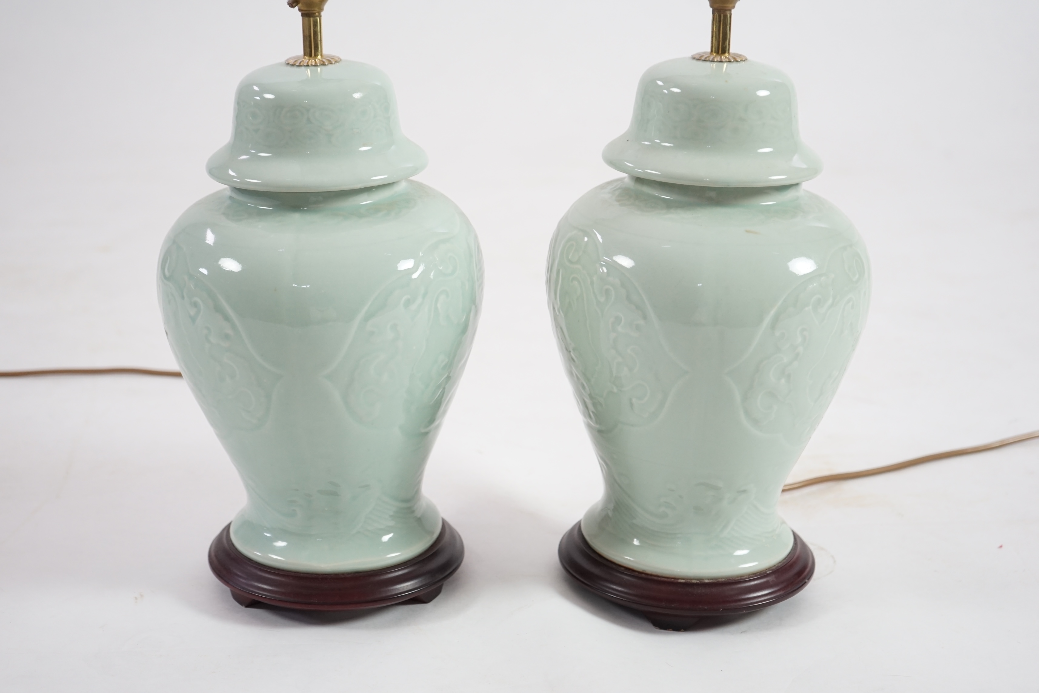 A pair of modern Chinese celadon glazed table lamps